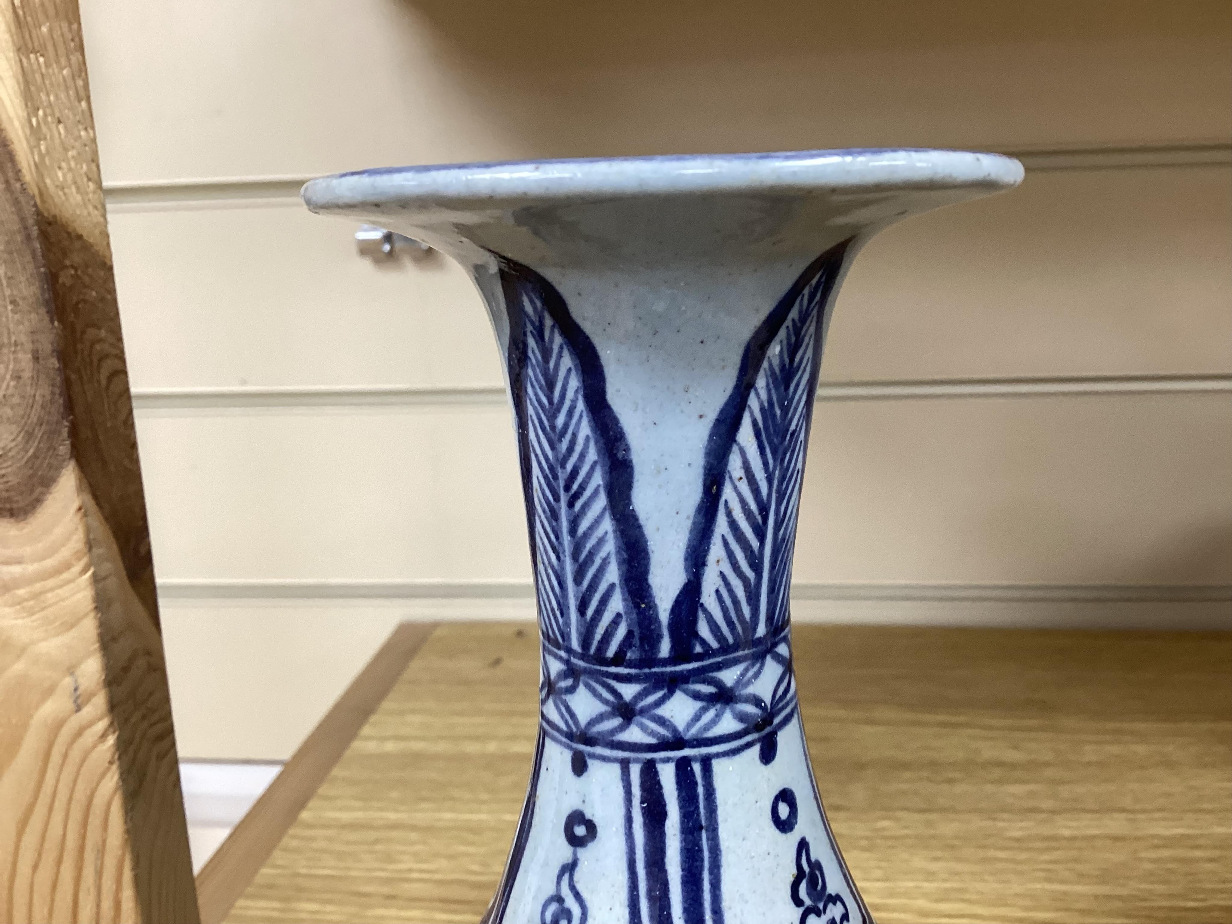 A group Oriental ceramics including Chinese famille rose plates, various tea bowls, a teapot, vases etc., tallest blue and white vase 21.5cm high (28). Condition - fair